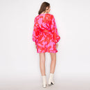 Abstract print mini dress with long sleeves
