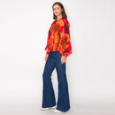 Jewel color abstract print long sleeve blouse