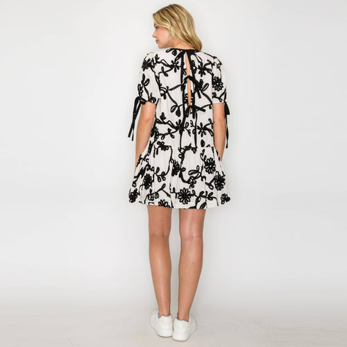 Ivory with Black Rosette Detail Mini Dress